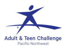 Logo of Adult & Teen Challenge Pacific Northwest featuring a stylized human figure with arms and legs outstretched, forming a star above the organization's name in blue lettering, representing their commitment to helping