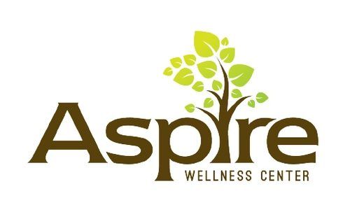 Logo of Aspire Wellness Center featuring a stylized tree with green leaves above the word "aspire" in brown, with "Wellness Center" written underneath, symbolizing the fusion of