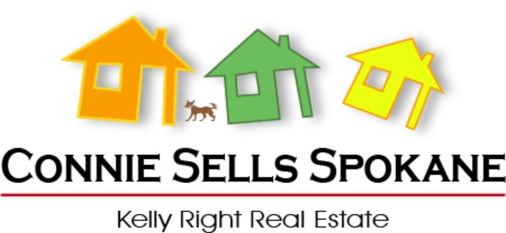 Real estate advertisement featuring colorful house illustrations and a small dog graphic, representing "Connie sells Spokane" for clients at Kelly Right Real Estate.