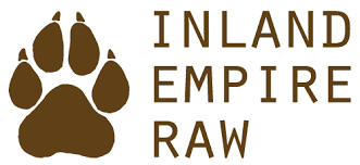 The image displays a logo consisting of the text "Inland Empire Raw" in capital letters, with a large brown paw print above the text, symbolizing our commitment to client satisfaction and management.