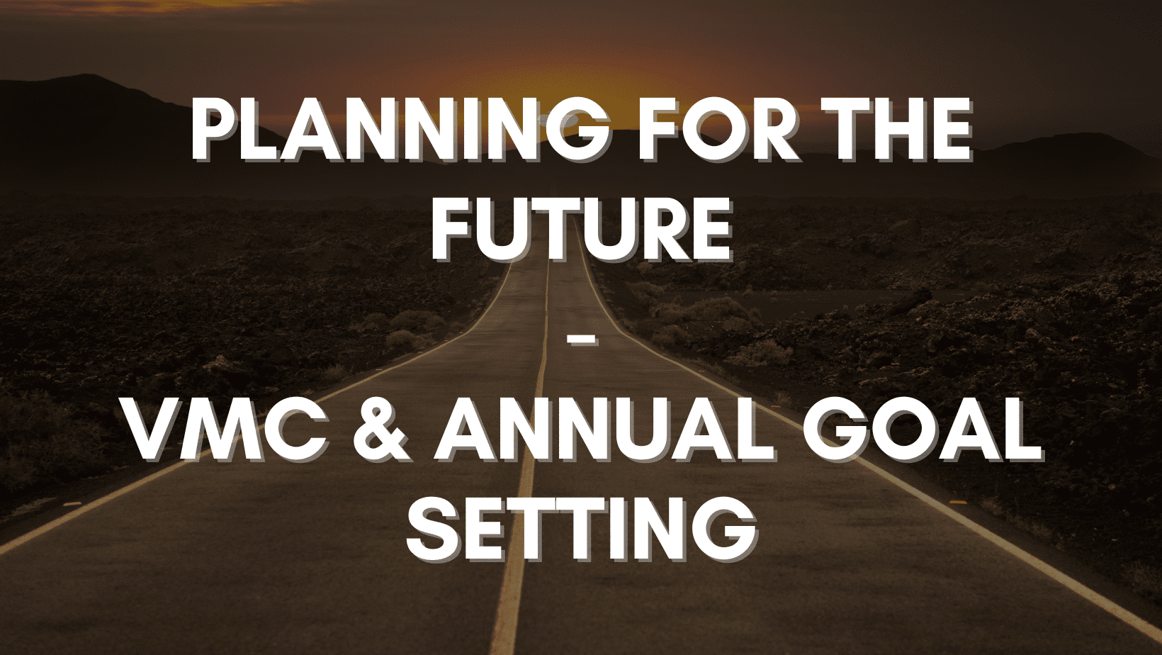 A motivational poster featuring a road at sunset with the text "annual planning & VMC - setting goals for the future" overlaying the image.